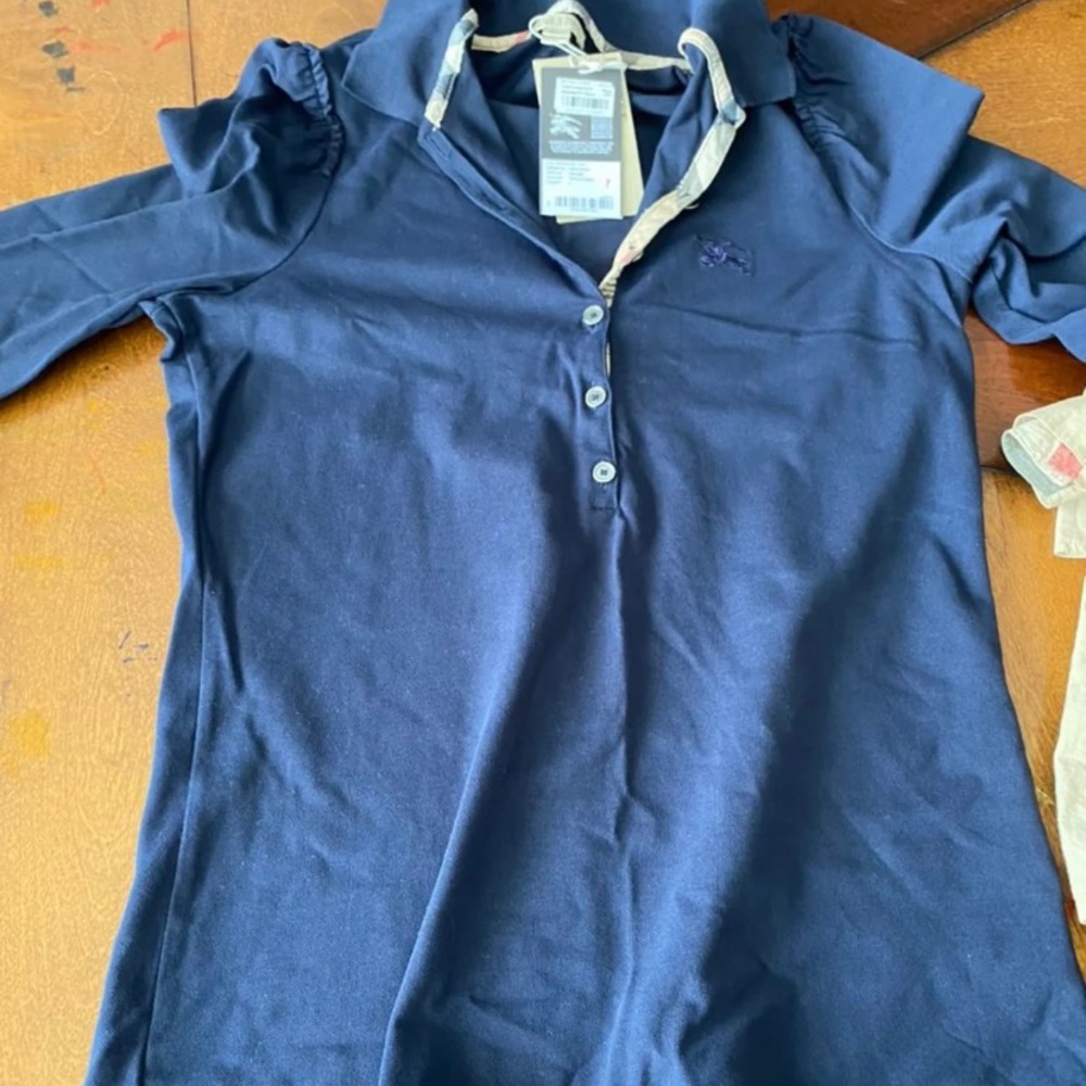 Burberry polo in like new condition. Wore it two times.